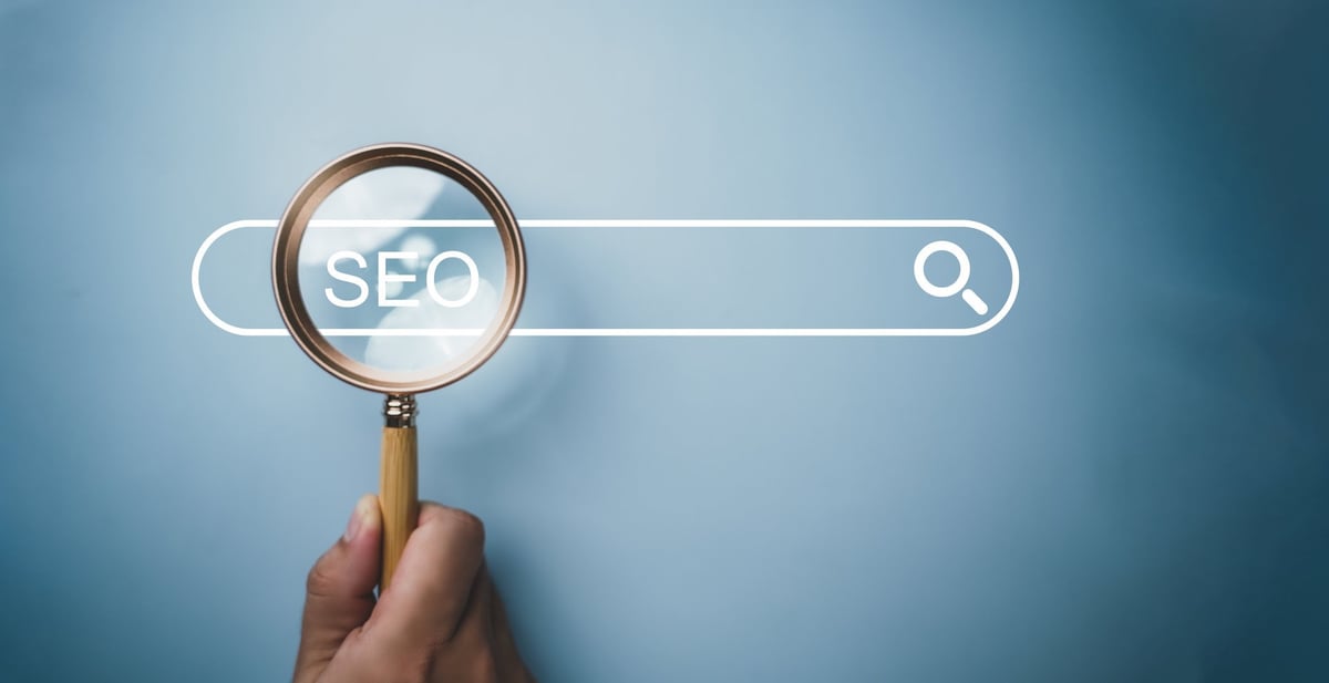 Businessman using computer to analyze SEO, search engine optimization, marketing, traffic ranking, website, internet, business, technology, concept.